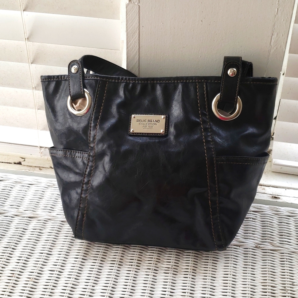 Relic black pocketbook, in gently used condition.